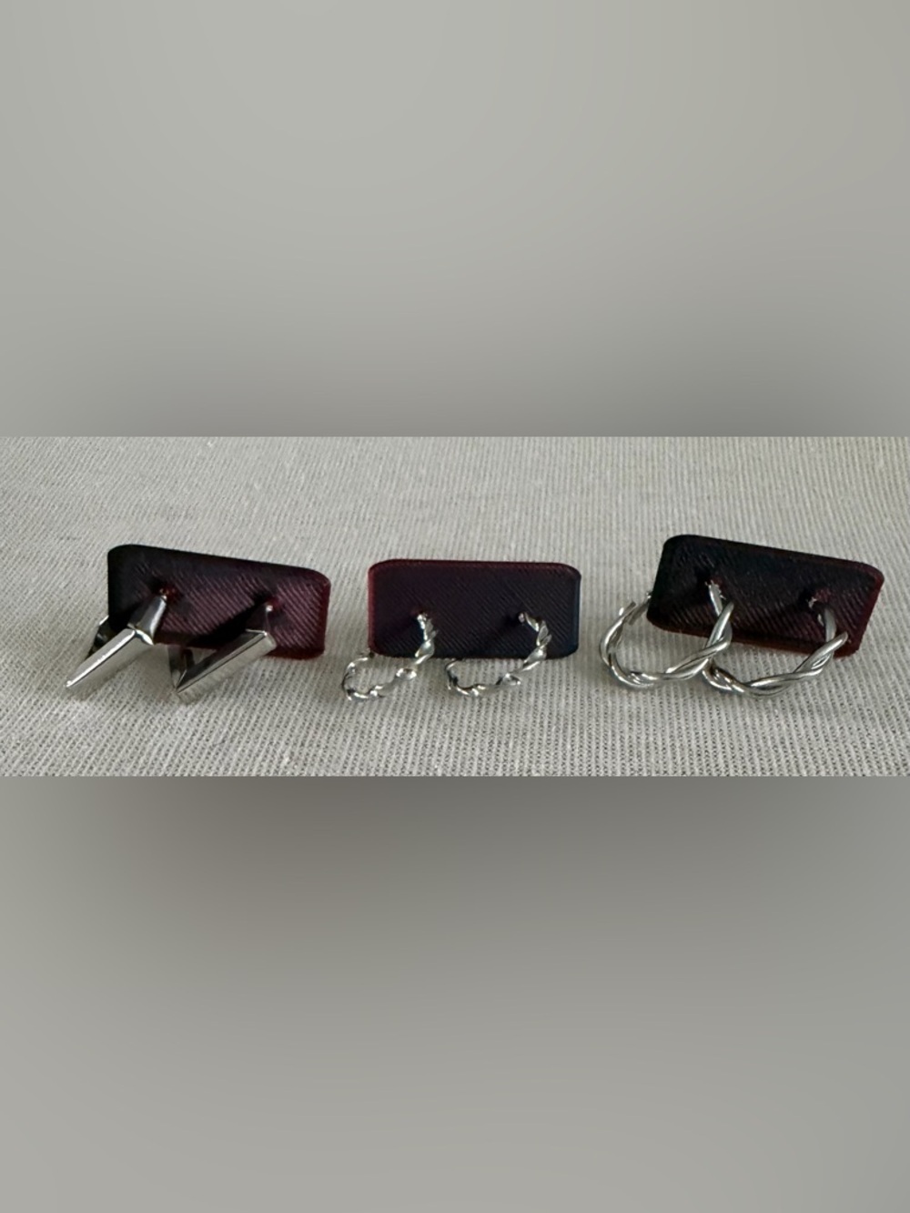 Set of Three Silver Tone Earrings